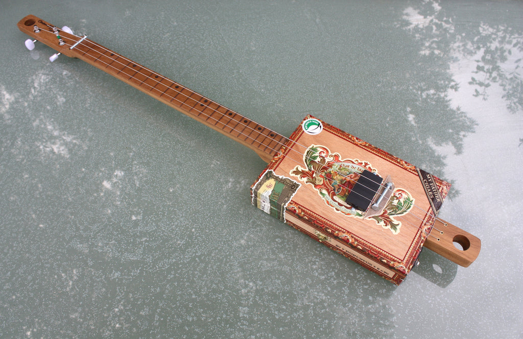 Flor de las Antillas - Fretless lefty - 3 string cigar box guitar