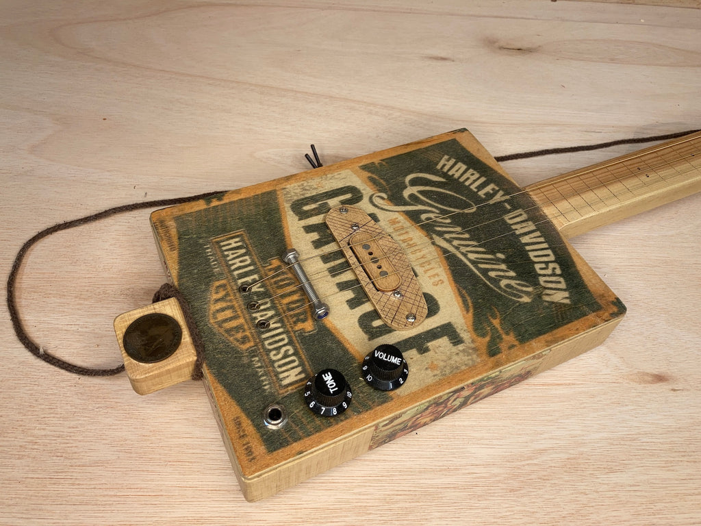 PRE-OWNED "Harley Davidson" Freless 3 string cigar box guitar