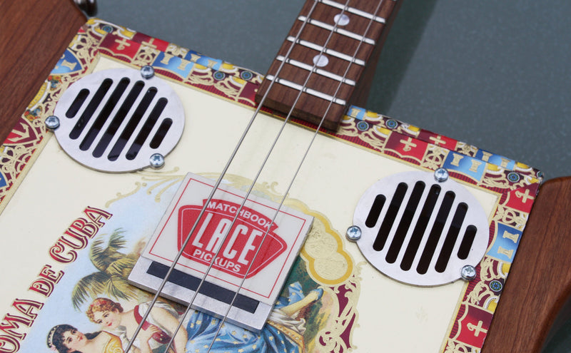 Steel soundhole trims (pair), art deco slotted on cigar box guitar, fixing screws included.