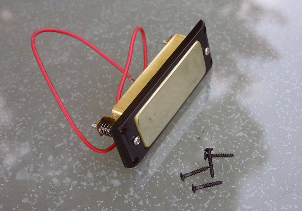 Brass Mini Humbucker Pickup - with black mounting ring.