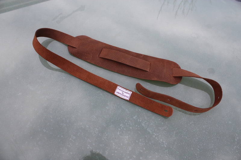 Handmade Uber Doofer Leather Guitar Strap, available plain or with a shoulder pad.