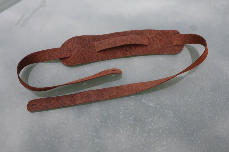 Handmade Uber Doofer Leather Guitar Strap, available plain or with a shoulder pad.