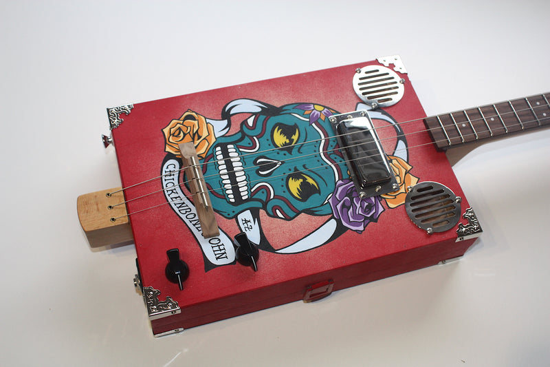 Handpainted Skulls 'n ' Roses - 3 String CBG with custom hardshell case.