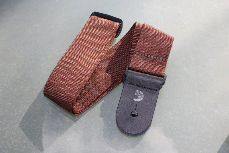 Guitar strap brown made from polypropylen. Made by d'Addario.