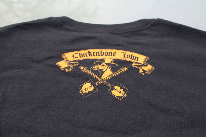 ChickenboneJohn T-Shirt with Plague Doctor design. White on black, with small logo on the back. 100% cotton.