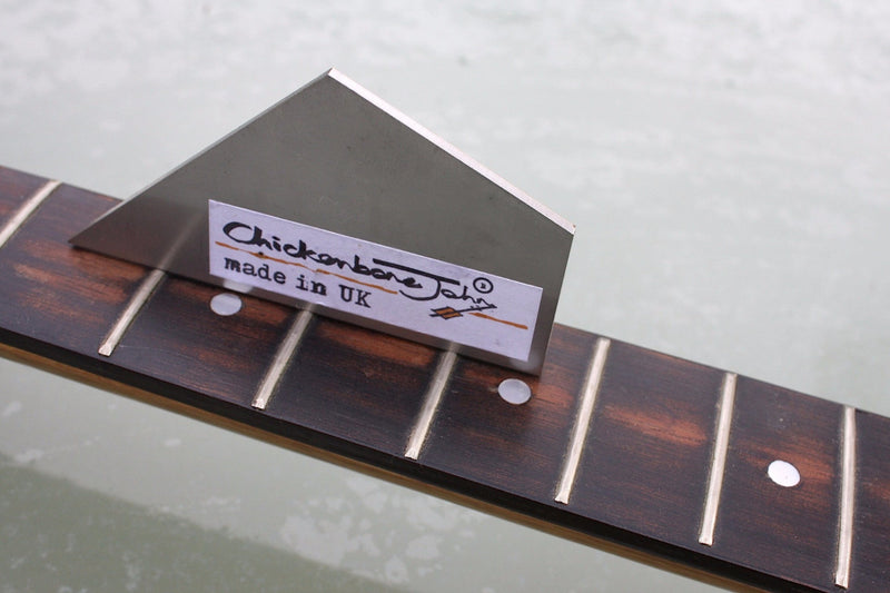 Stainless steel fret rocker to level out guitar frets. 