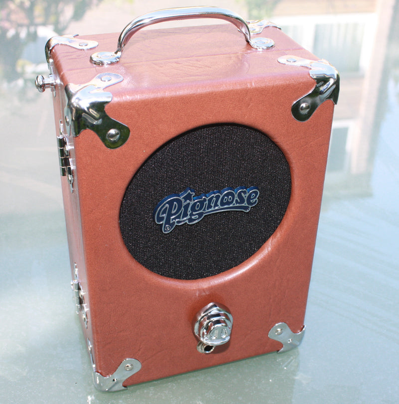 The Legendary Pignose 7-100 Battery Amplifier. Available in 3 finishes original, tweed and snakeskin.