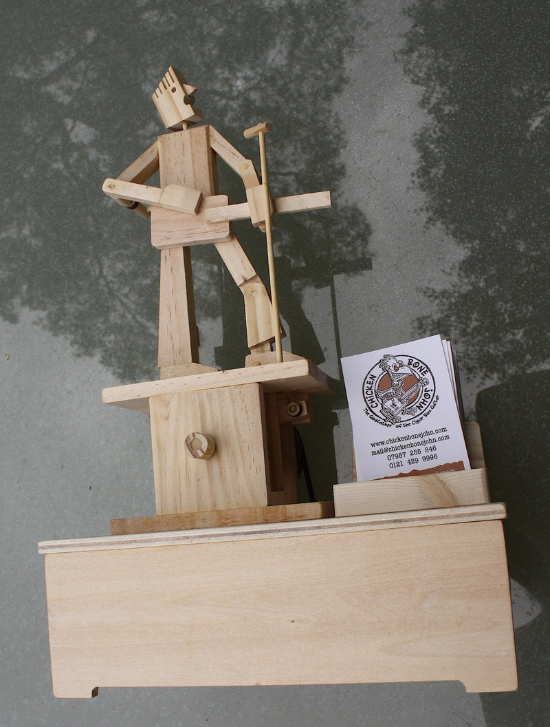 Guitar Player Timberkit Automaton fully built on battery driven base. With custom business card holder.